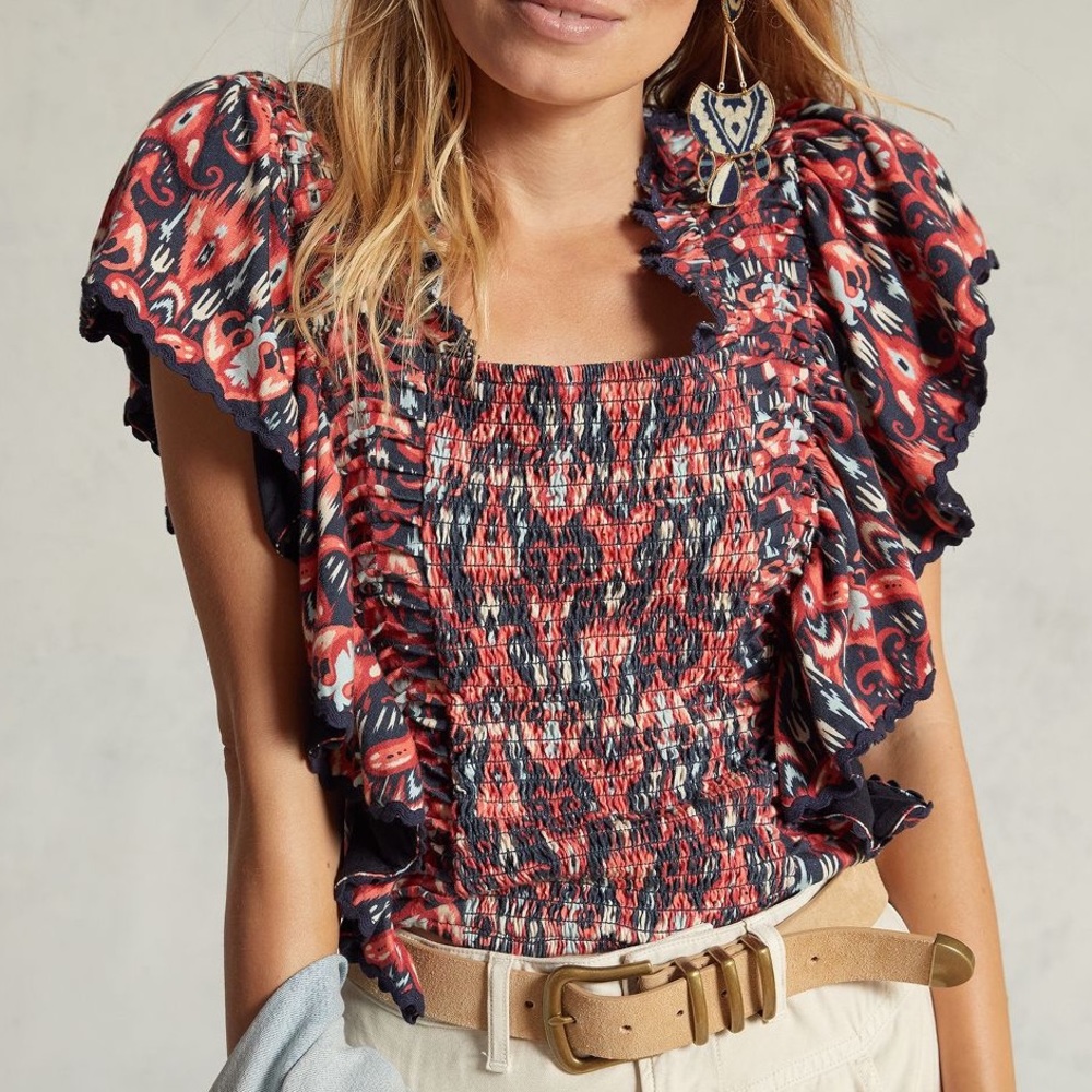 Anthropologie smocked top with ruffle sleeves in multicolor